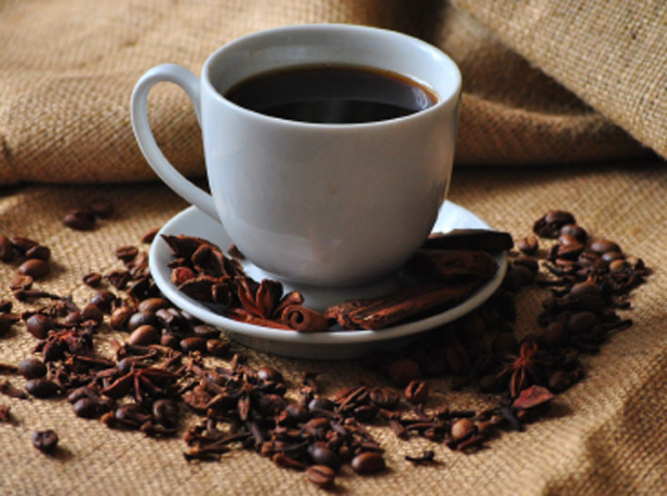 cup of coffee with beans